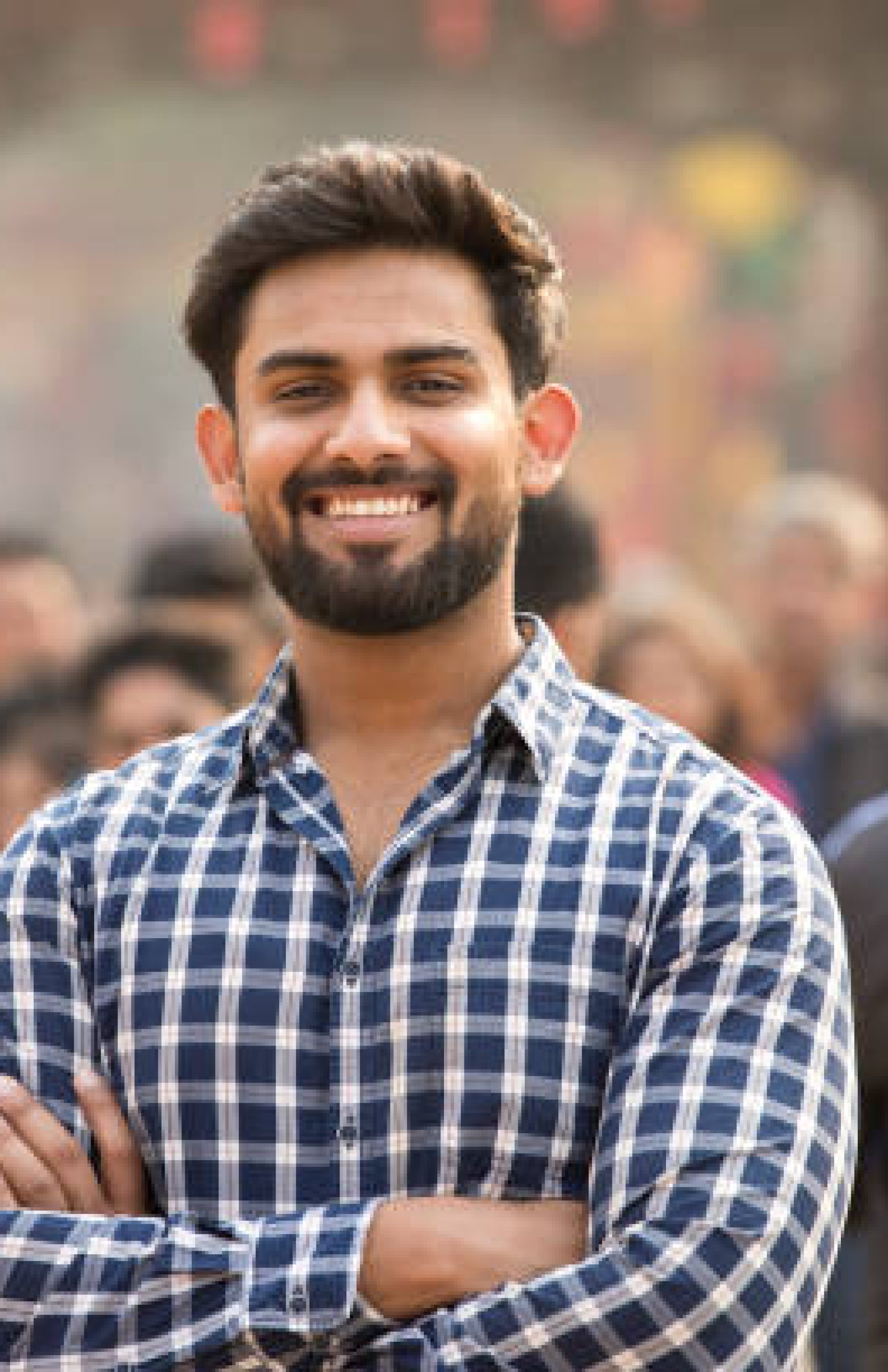 happy indian man at street market happy indian man at street market